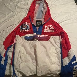 Small, Copper rivet windbreaker. Motor sport themed, unused.